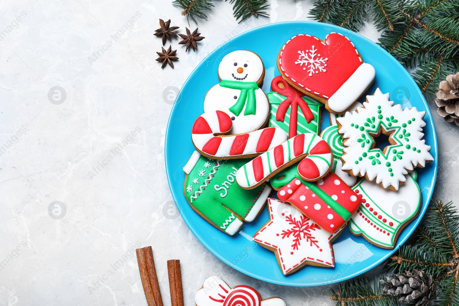 Photo of Delicious Christmas cookies on light marble table, flat lay. Space for text