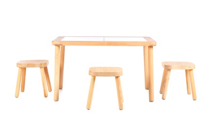 Photo of Small table and chairs for little kids on white background