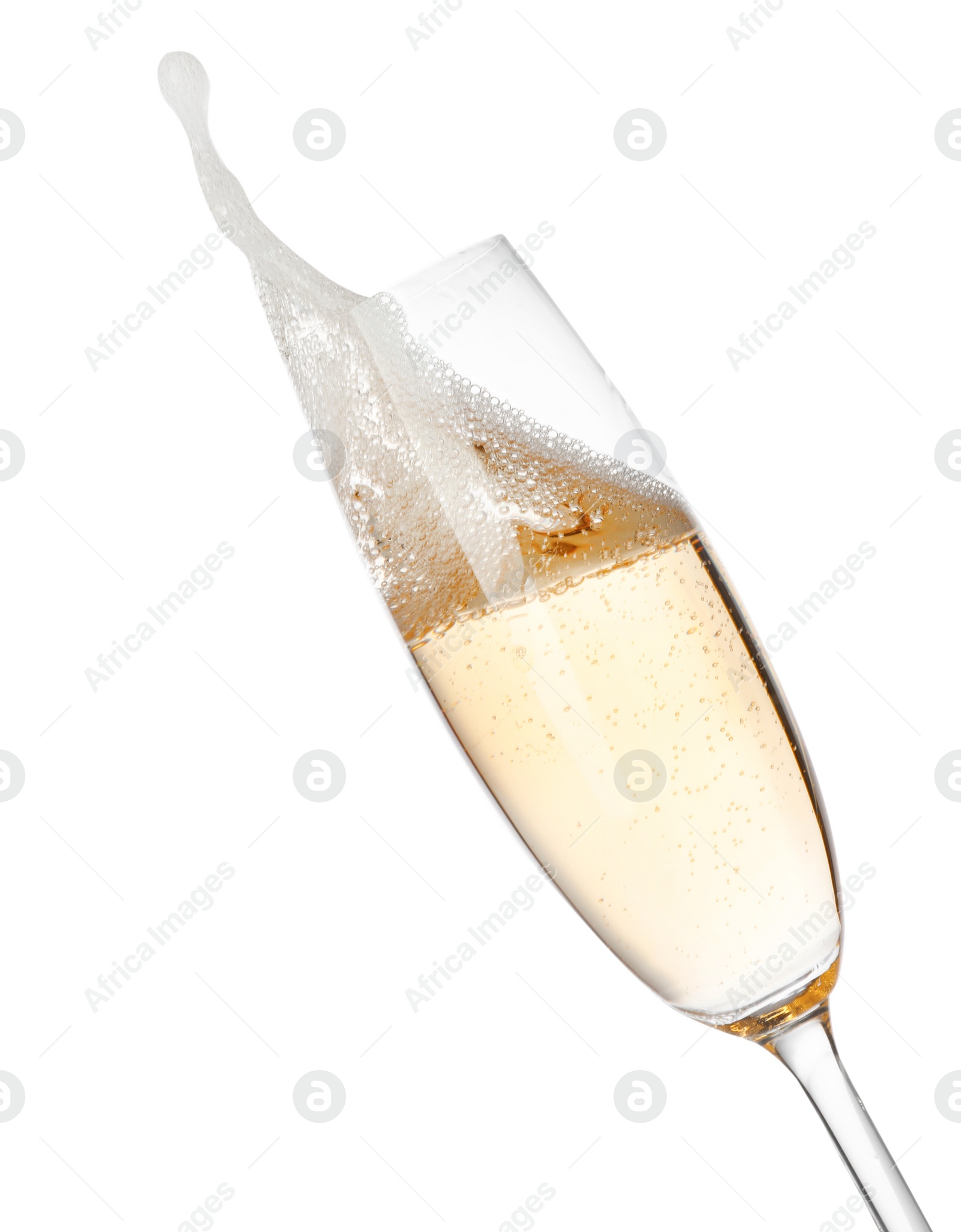 Photo of Glass of champagne on white background. Festive drink