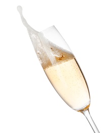 Photo of Glass of champagne on white background. Festive drink