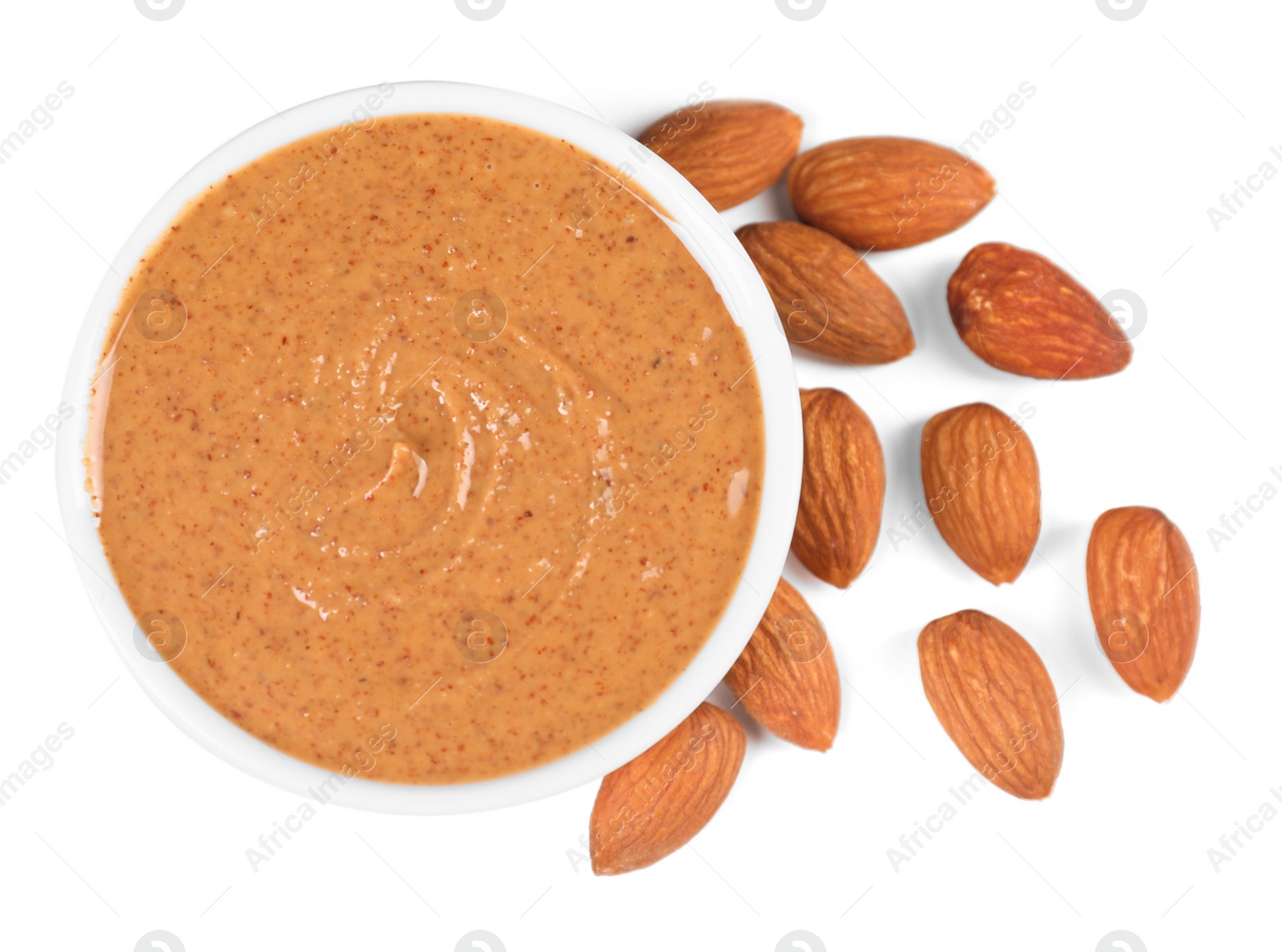 Photo of Delicious nut butter and almonds isolated on white, top view