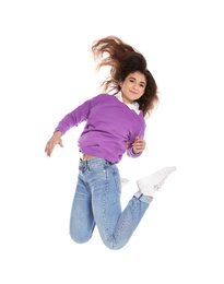 Photo of Beautiful young woman in stylish clothes jumping on white background