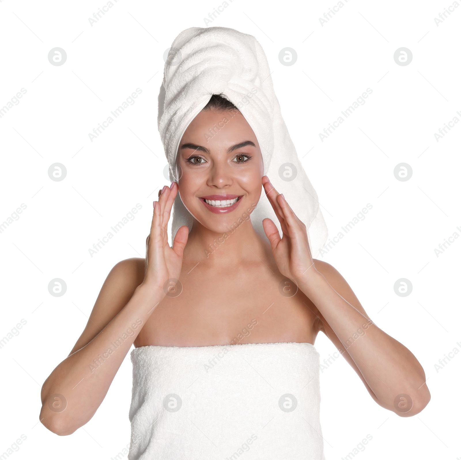 Photo of Beautiful young woman with towels on white background