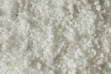 Organic sea salt as background, top view