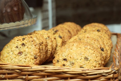 Wicker tray with fresh cookies in bakery