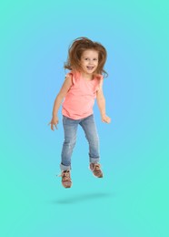 Image of Happy cute girl jumping on color gradient background