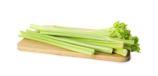 Photo of Fresh green celery stems isolated on white