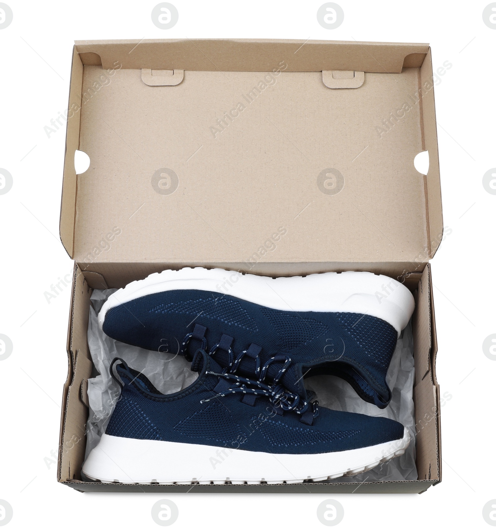 Photo of Pair of stylish sport shoes in cardboard box on white background, top view