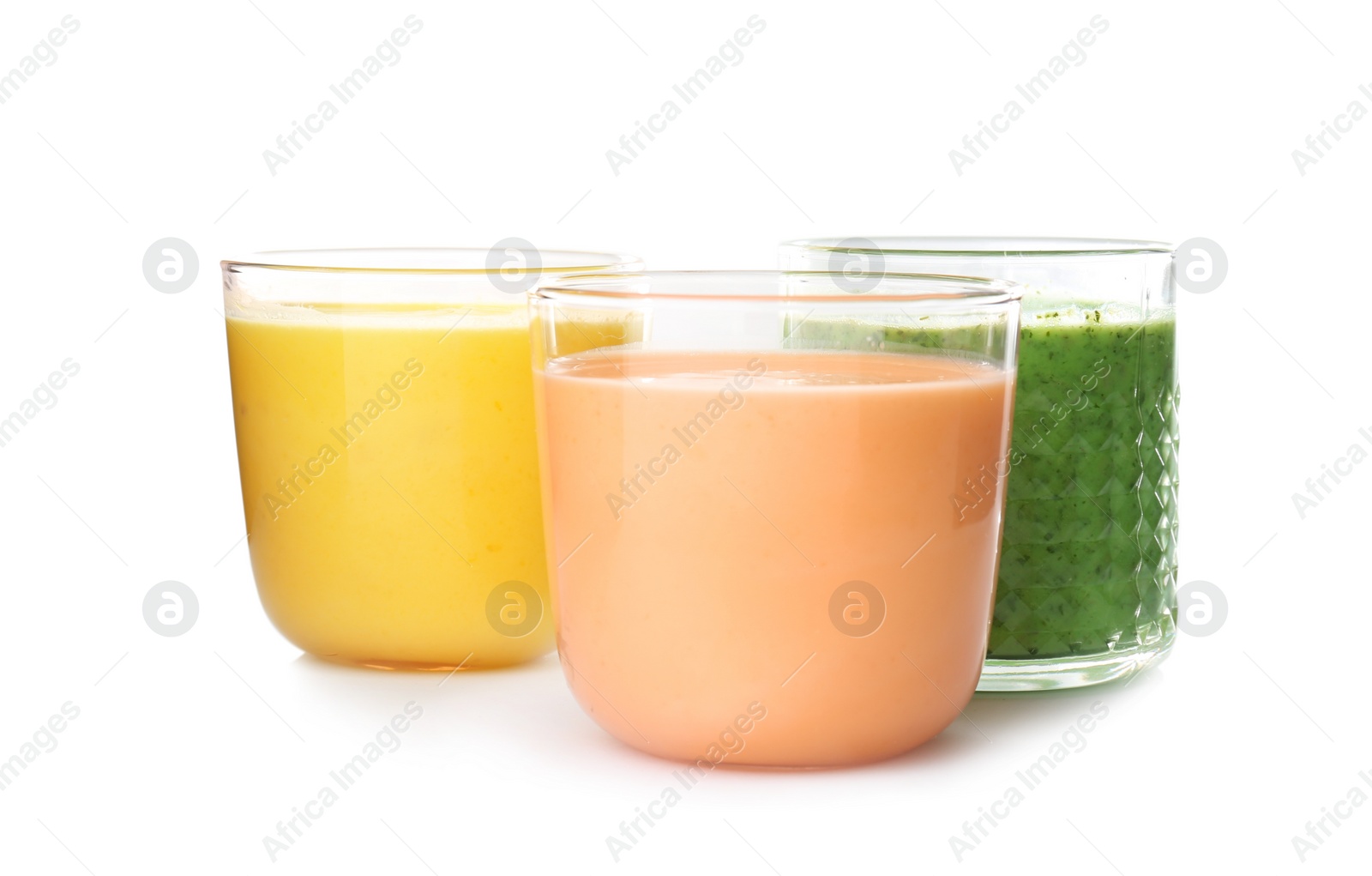 Photo of Glasses with delicious detox smoothies on white background