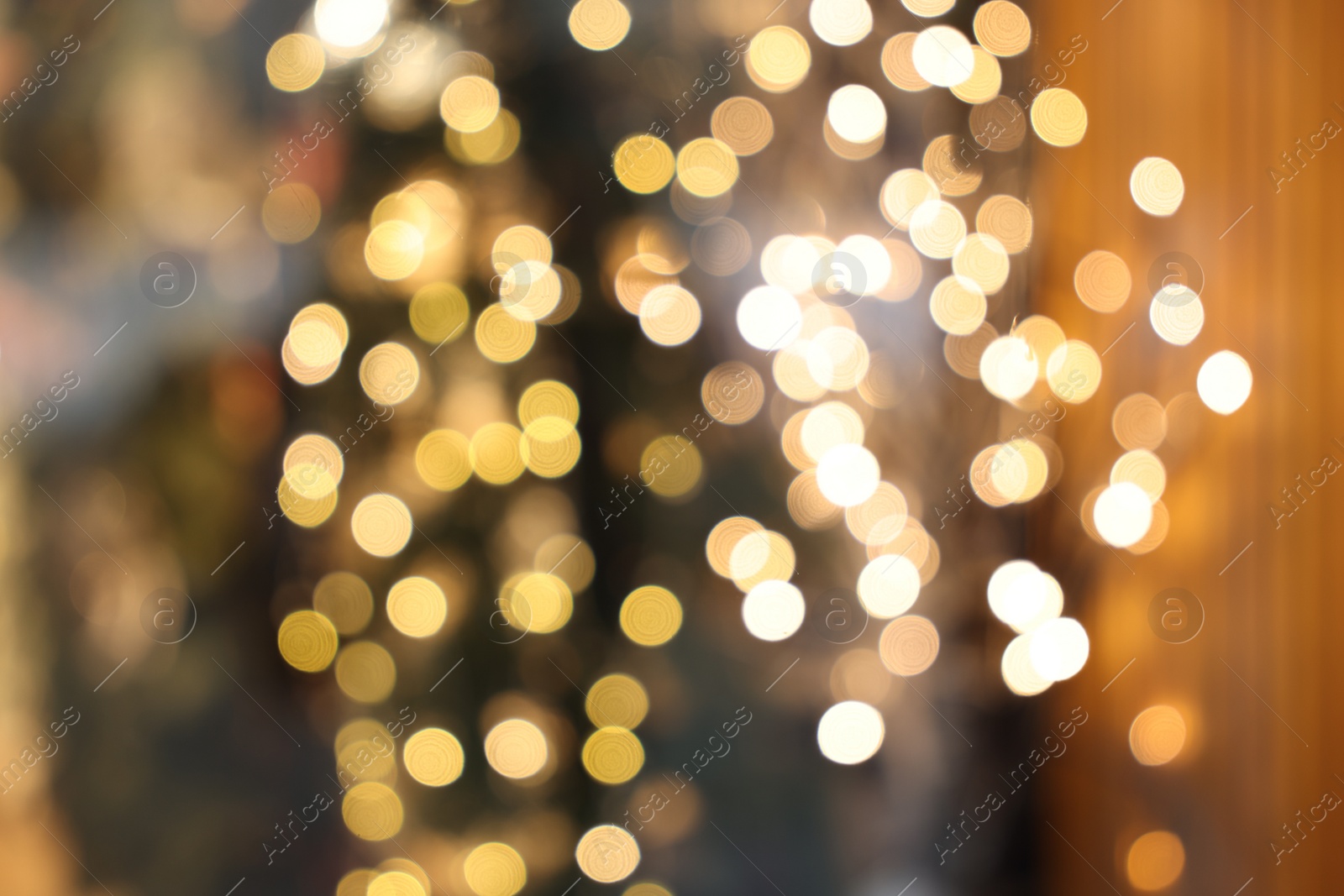 Photo of Blurred view of beautiful Christmas lights. Bokeh effect