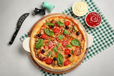 Photo of Flat lay composition with tasty homemade pizza on table