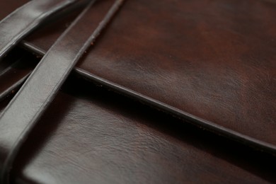 Photo of Texture of brown leather as background, closeup