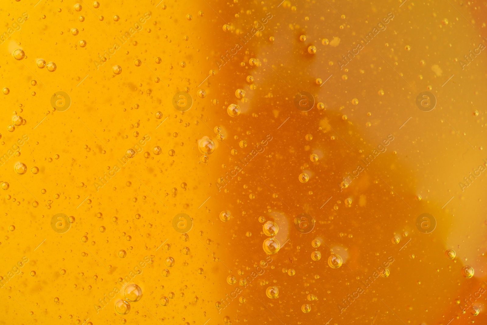 Photo of Closeup view of fresh honey as background