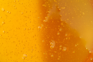Photo of Closeup view of fresh honey as background