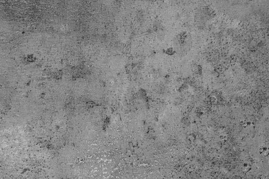 Texture of grey stone surface as background, closeup