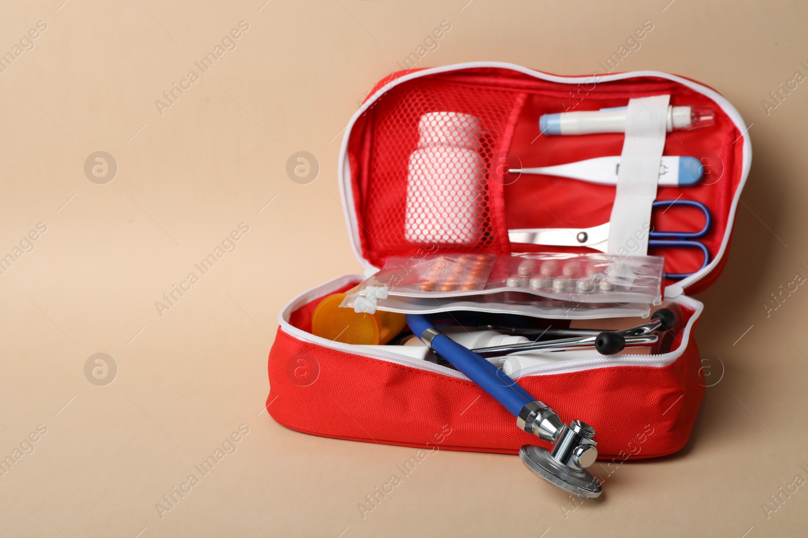 Photo of First aid kit on color background. Health care