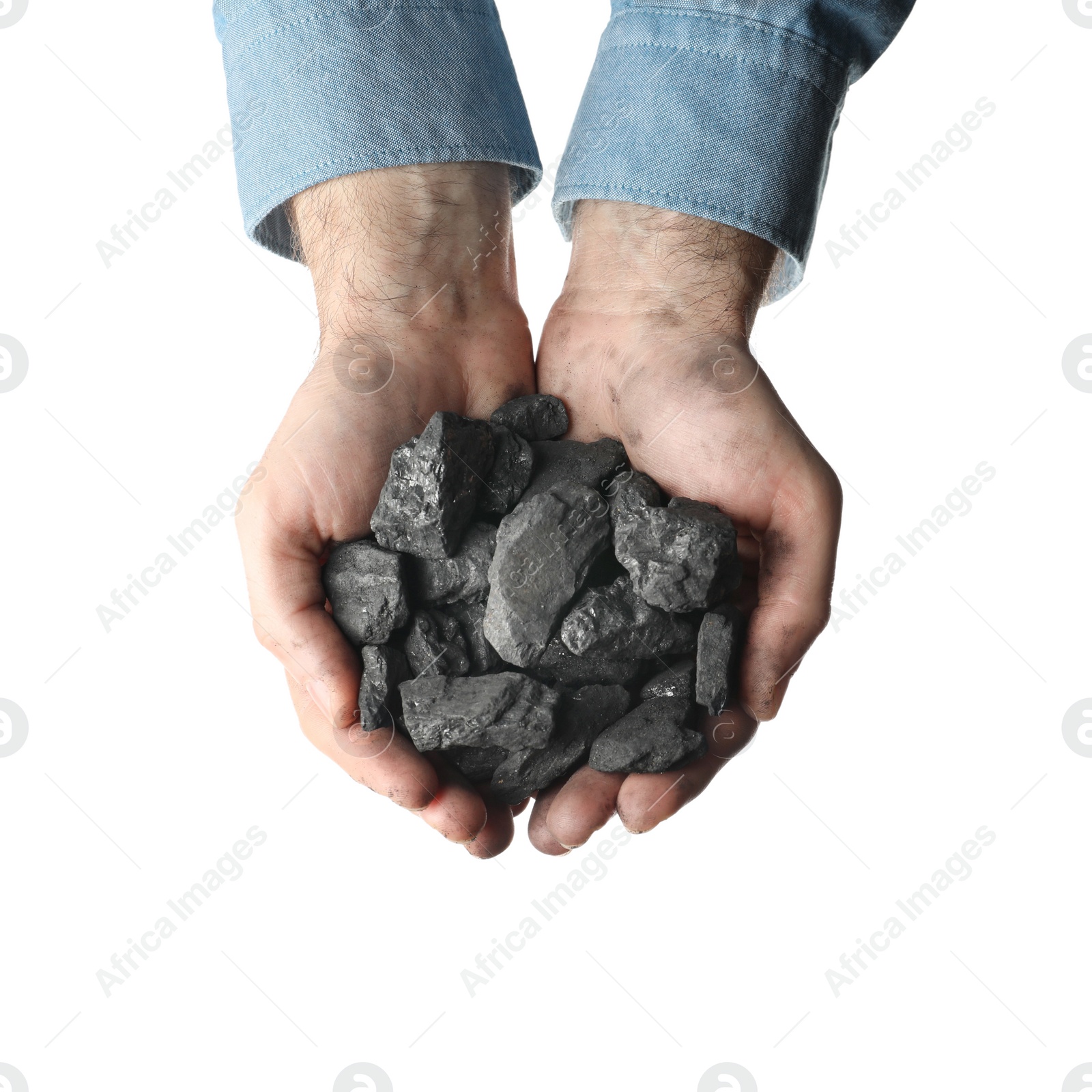 Photo of Man holding coal in hands on white background, top view