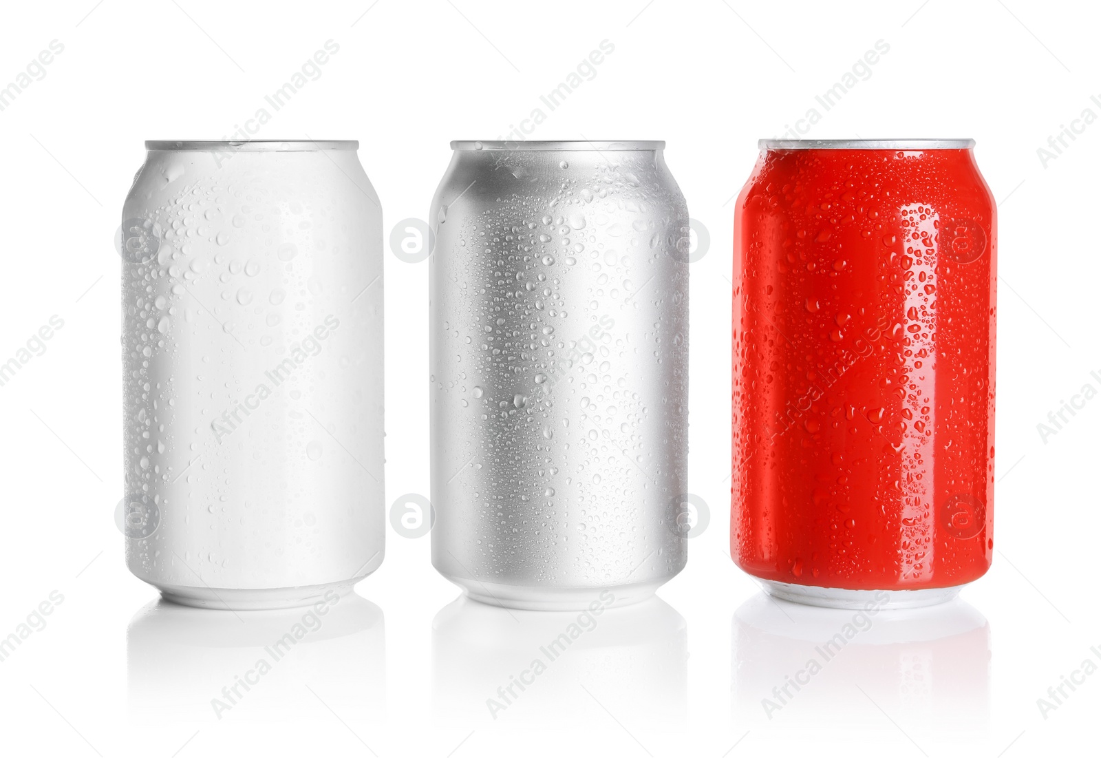 Photo of Aluminum cans with drinks on white background