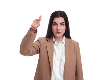 Photo of Beautiful businesswoman pointing at something on white background