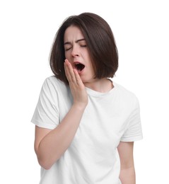 Photo of Sleepy young woman yawning on white background. Insomnia problem
