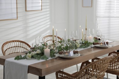 Festive table setting with beautiful tableware and decor indoors