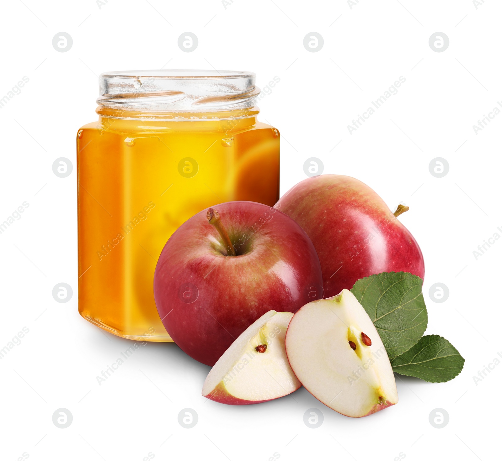 Image of Honey in glass jar and apples isolated on white