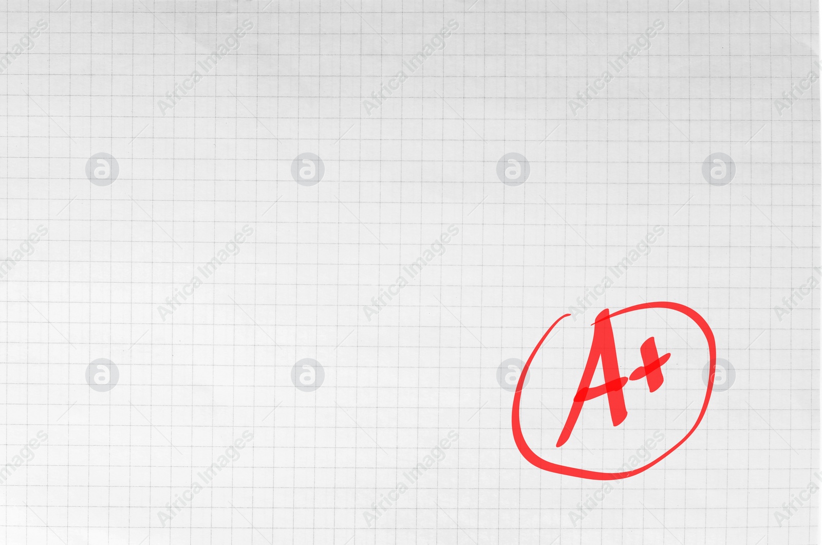 Image of School grade. Red letter A with plus symbol on notebook paper