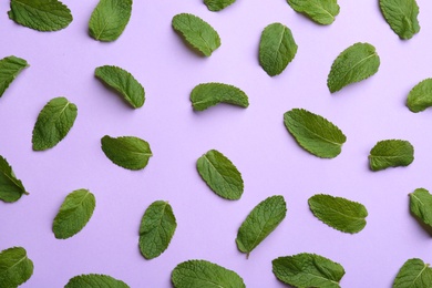 Photo of Fresh mint on purple background, flat lay