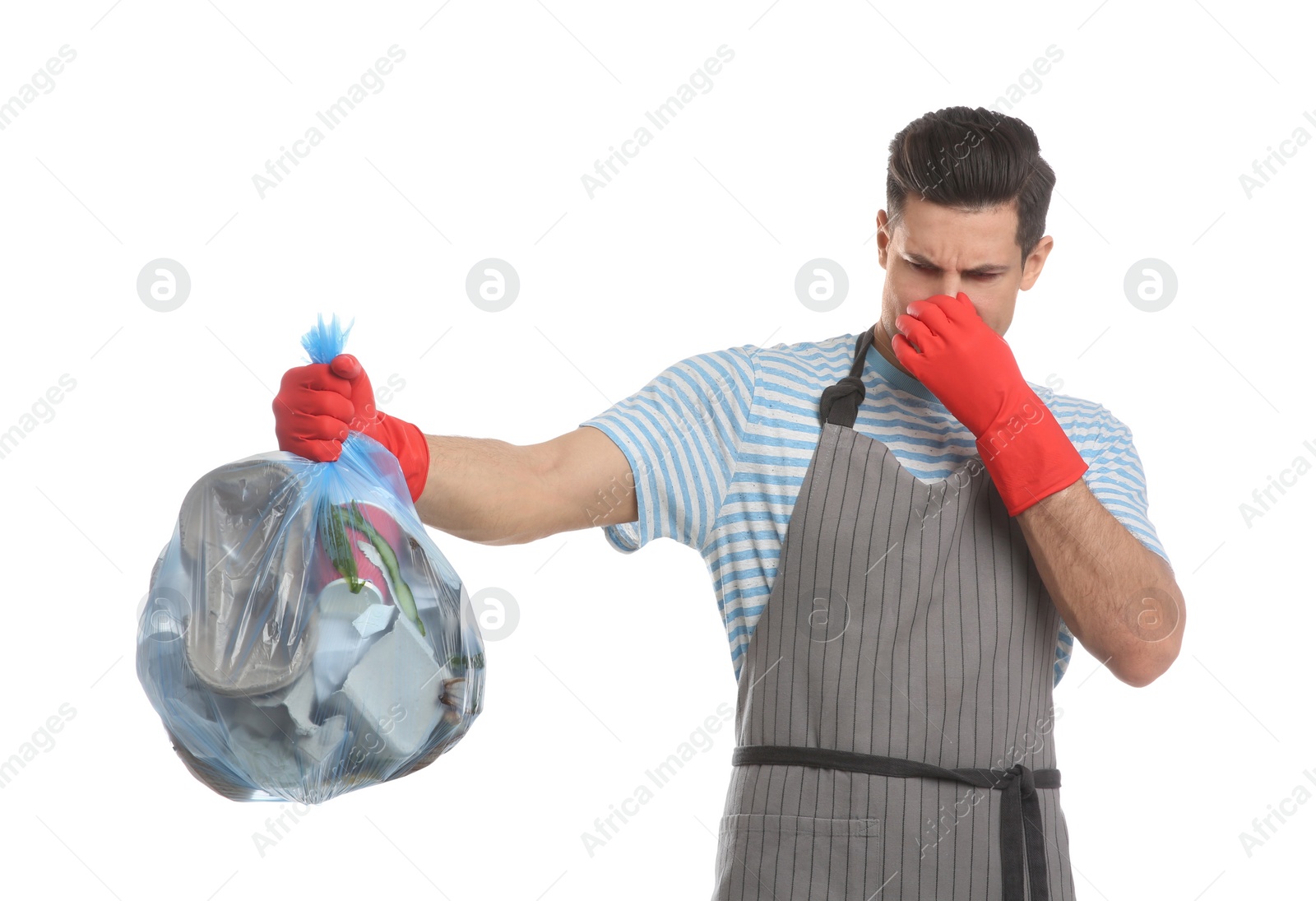 Photo of Man holding full garbage bag on white background