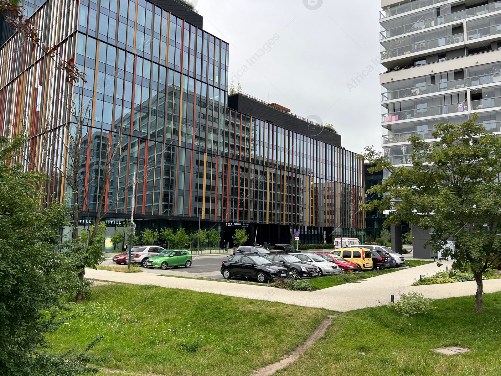 Photo of Exterior of modern buildings and parking lot