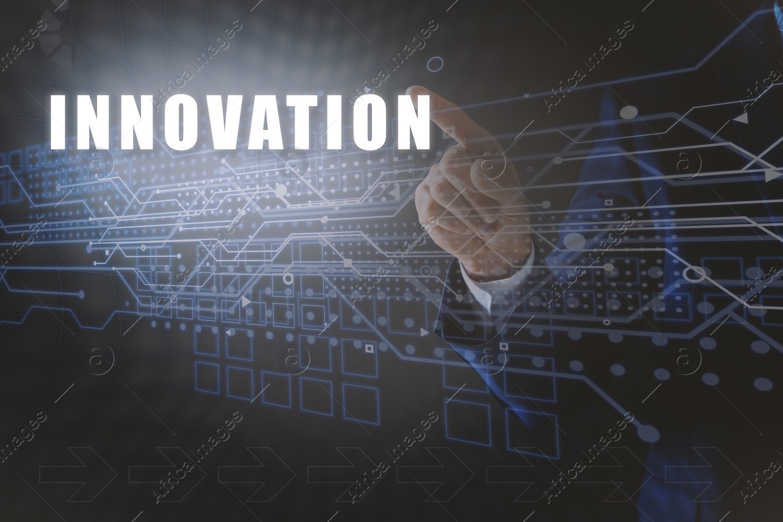 Image of Man touching word Innovation on digital screen against dark background, closeup