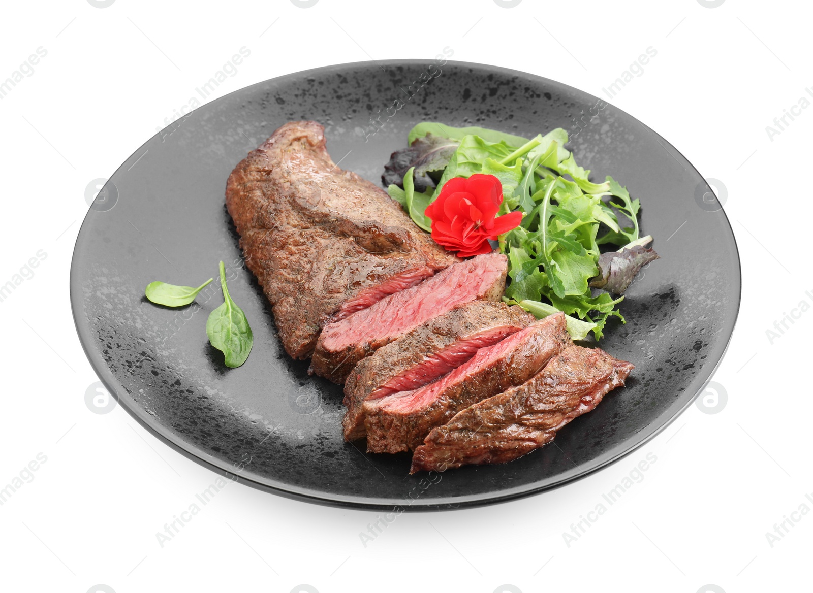 Photo of Pieces of delicious grilled beef meat and greens isolated on white