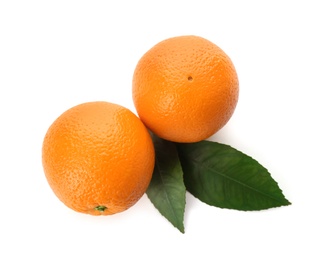 Fresh ripe oranges with green leaves on white background, top view