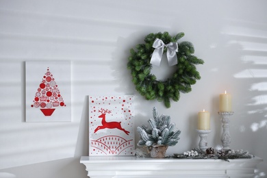 Photo of Beautiful Christmas pictures in festive room interior