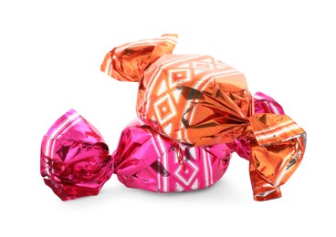 Photo of Sweet candies in colorful wrappers on white background