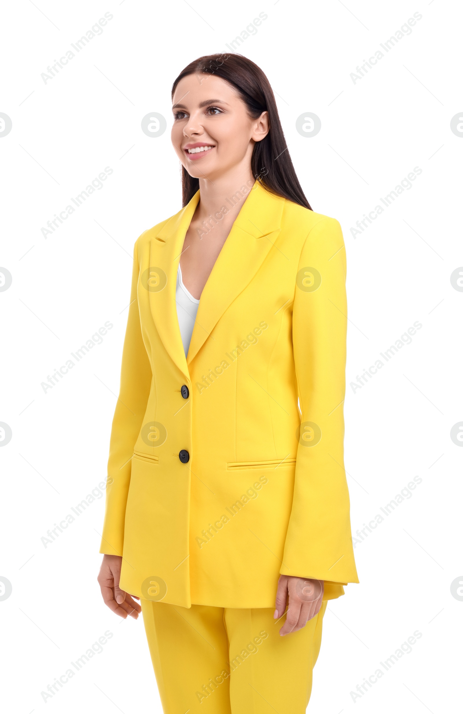 Photo of Beautiful happy businesswoman in yellow suit on white background