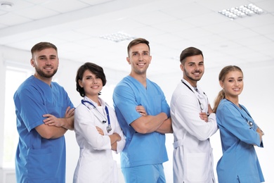 Photo of Team of doctors in uniform at workplace