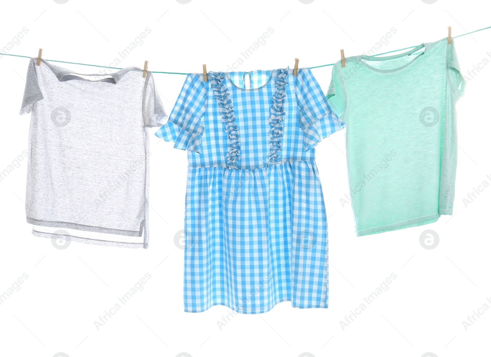 Photo of Clothes on laundry line against white background
