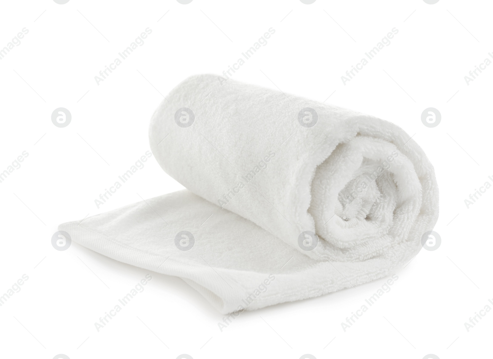 Photo of Rolled soft terry towel on white background