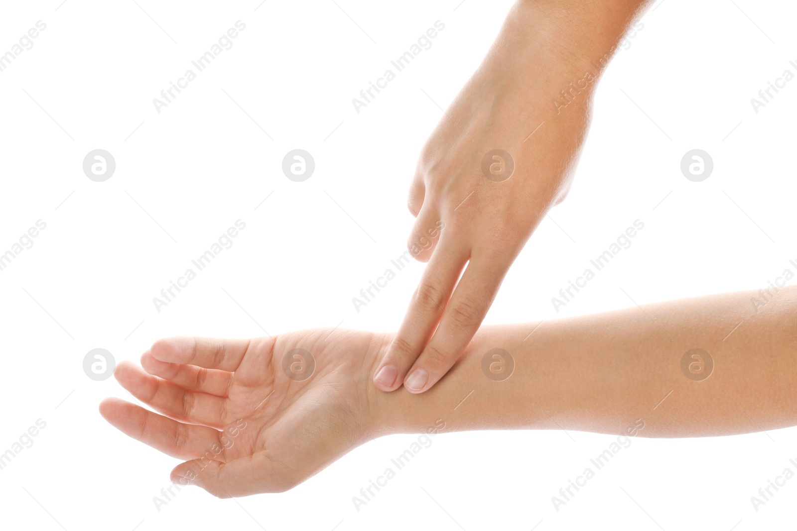 Photo of Woman checking pulse on wrist against white background, closeup