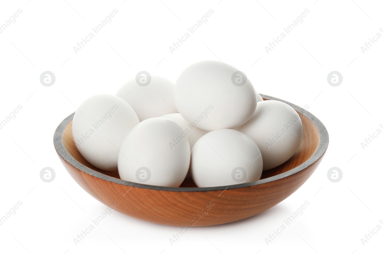 Photo of Bowl with raw chicken eggs on white background