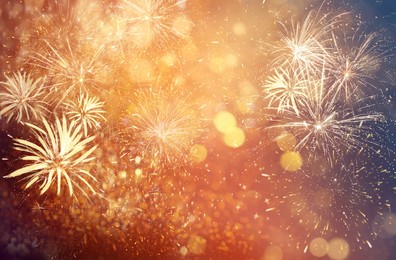 Image of Abstract festive background with fireworks, bokeh effect. New Year celebration