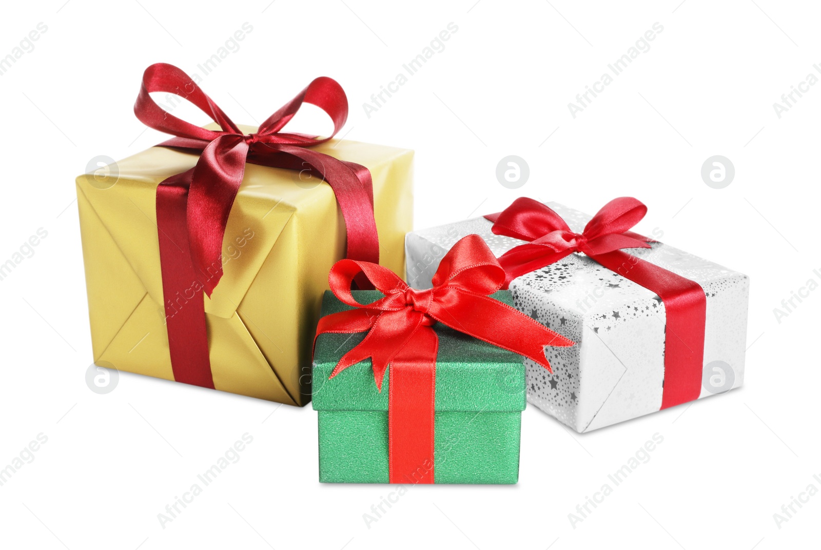 Photo of Different Christmas gifts in boxes on white background