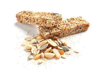 Photo of Grain cereal bars with nuts and raisins on white background