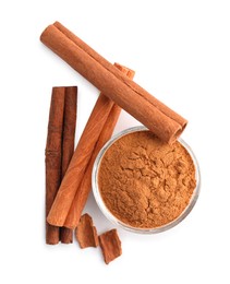 Dry aromatic cinnamon sticks and powder isolated on white, top view