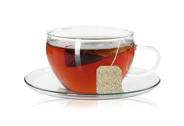 Photo of Brewing aromatic tea. Cup with teabag isolated on white