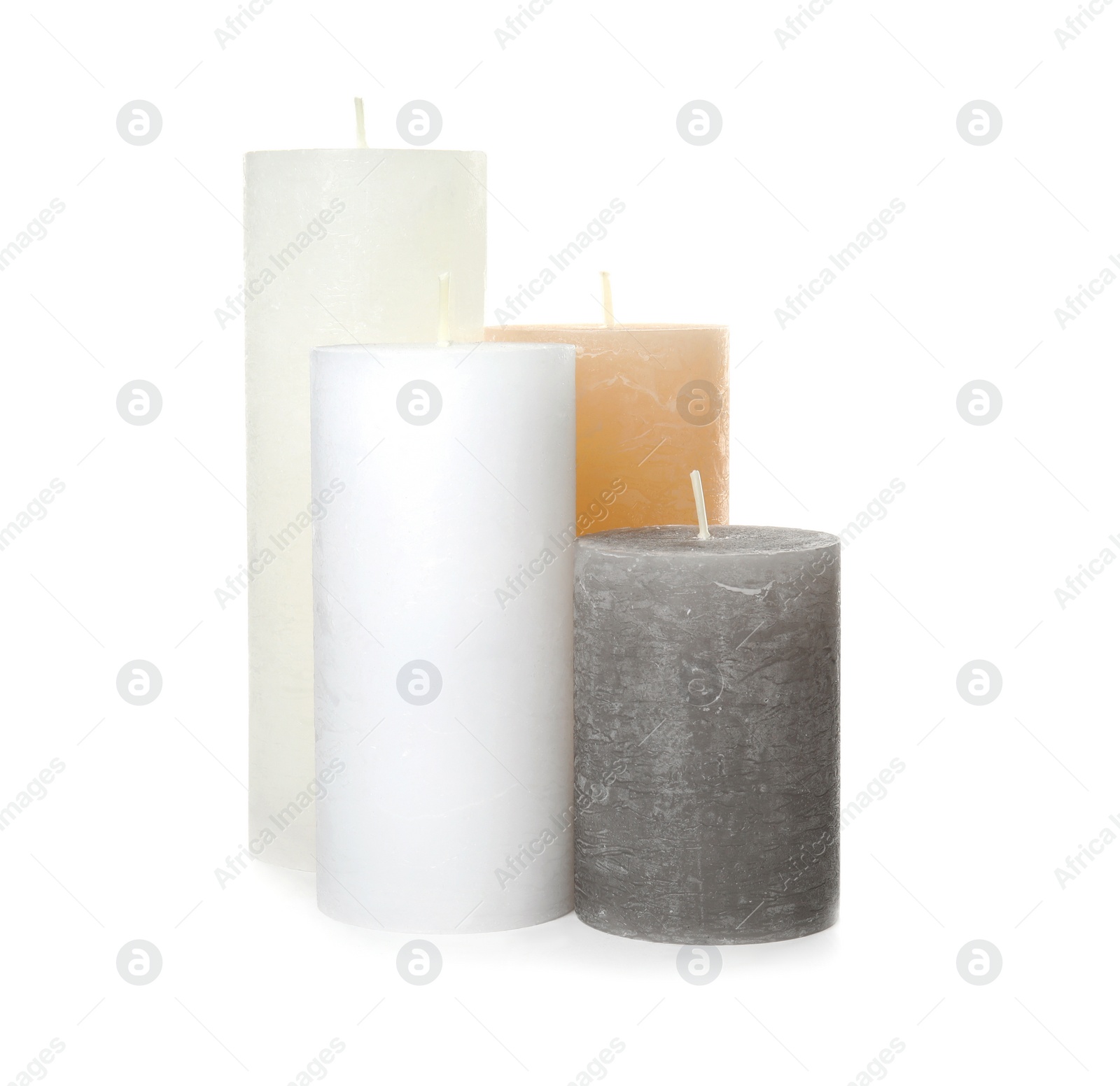 Photo of Many color wax candles on white background