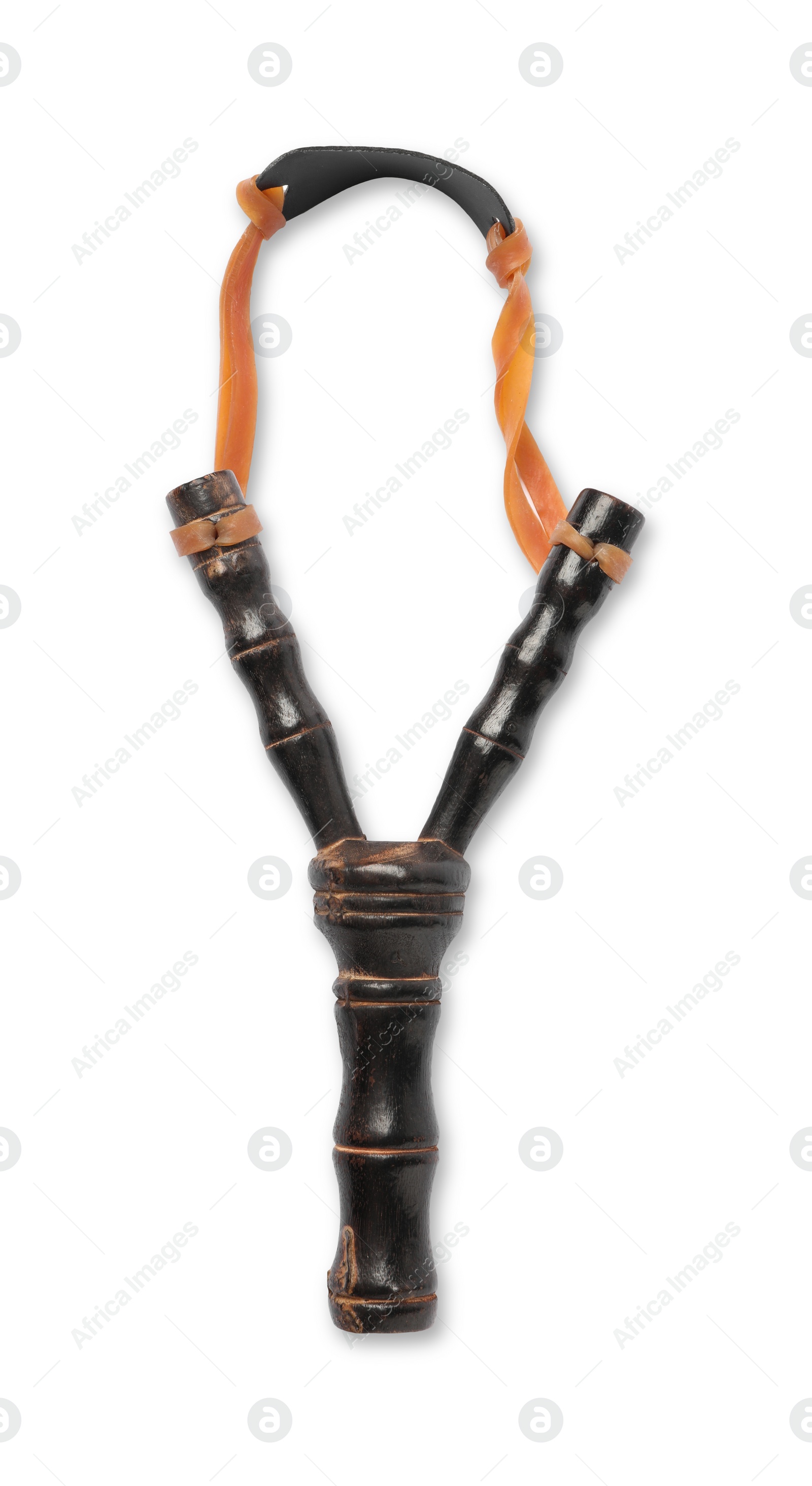 Photo of Black wooden slingshot with leather pouch on white background, top view