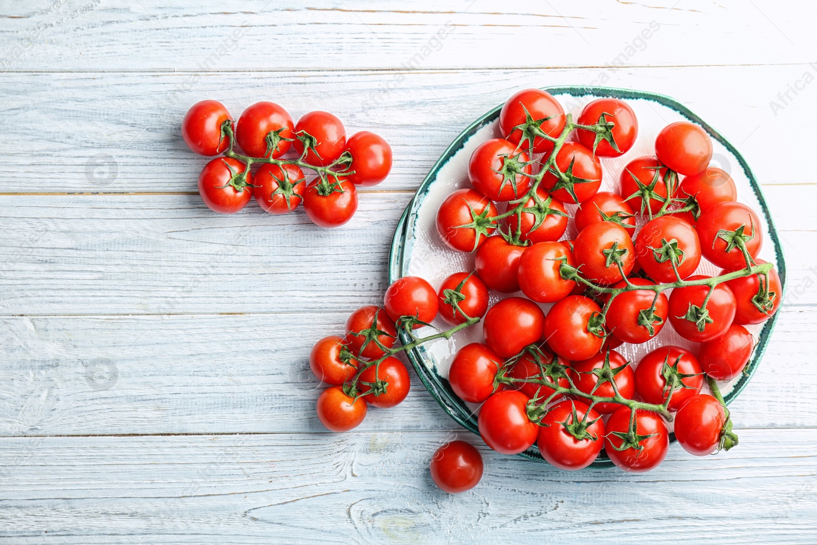 Photo of Flat lay composition with ripe tomatoes on wooden background