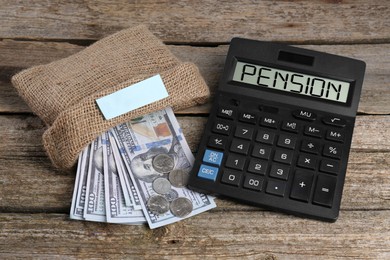 Image of Calculator with word Pension and money on wooden table